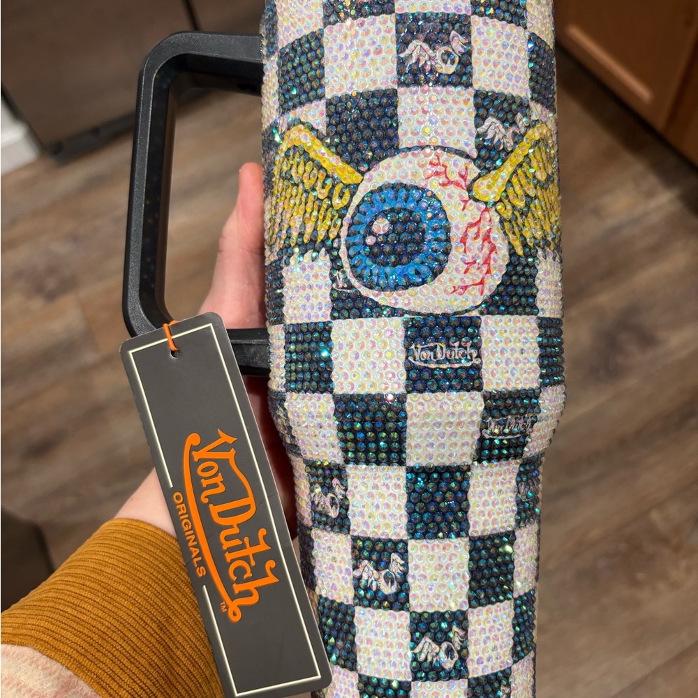 Von Dutch Black and White Checkered Decor with Yellow Winged Eye